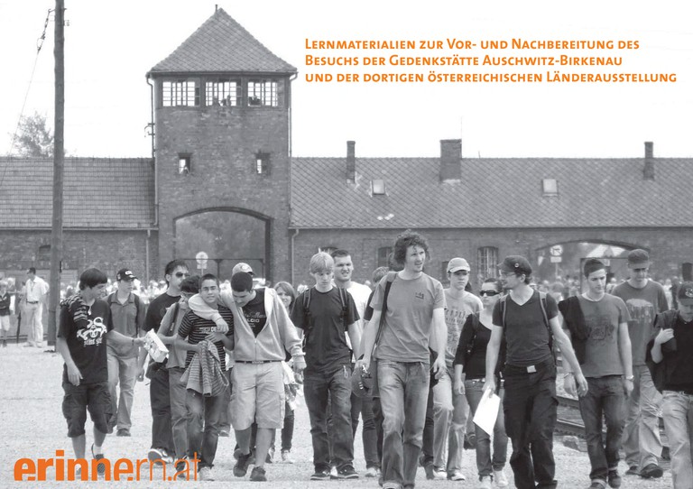 young people walking in the former nazi concentration camp auschwitz birkenau